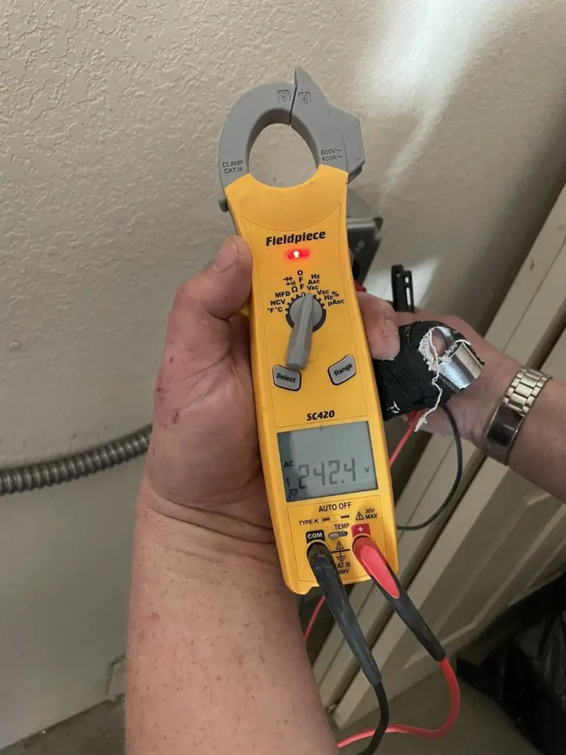 Voltage testing with clamp meter during Aluminum Wiring Replacement in Hinsdale